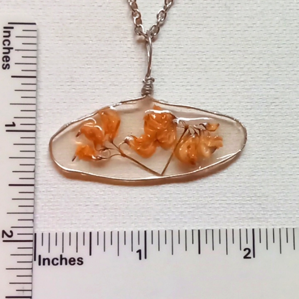 Floral necklace, amulet